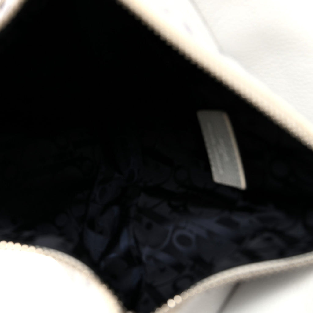 X Daniel Arsham Grained Calfskin Newspaper Print Saddle Bag White wholesalehk.shop