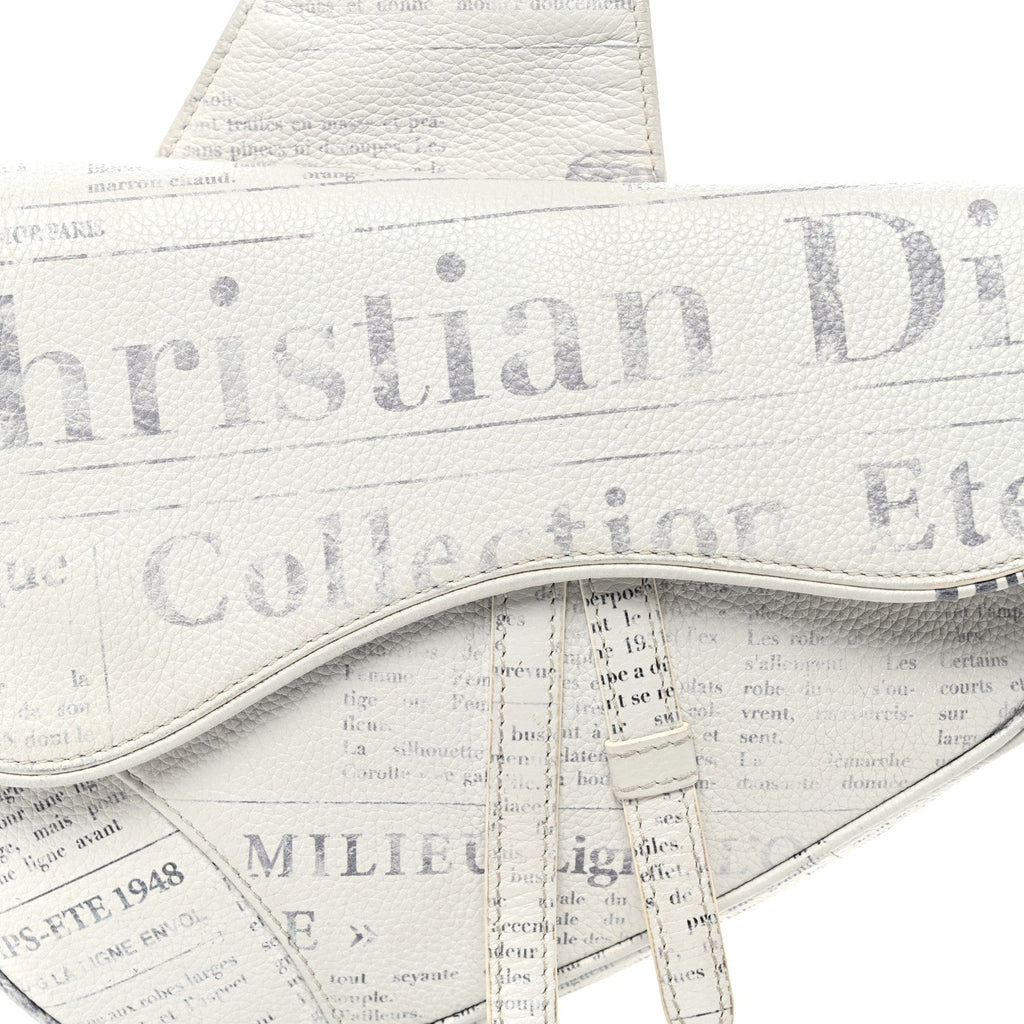 X Daniel Arsham Grained Calfskin Newspaper Print Saddle Bag White wholesalehk.shop