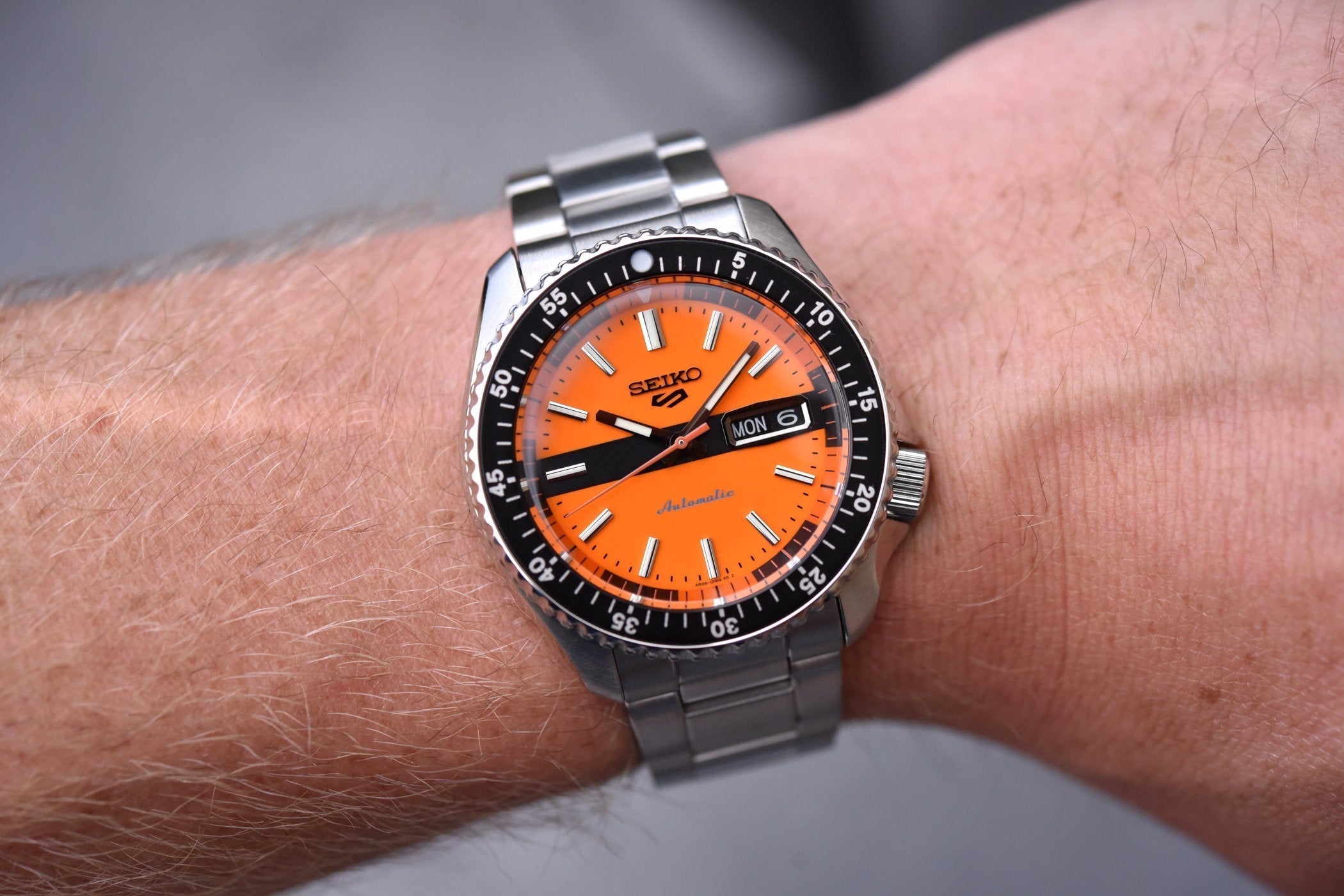 Seiko 5 Sports Double Hurricane Retro Orange Dial Silver Steel Strap Watch For Men - SRPK11K1 wholesalehk.shop