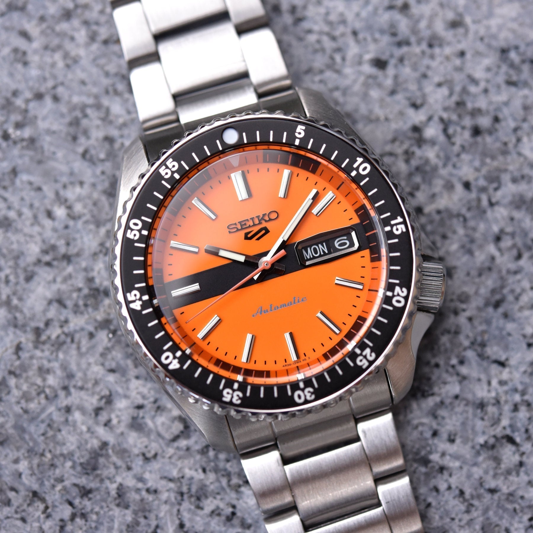 Seiko 5 Sports Double Hurricane Retro Orange Dial Silver Steel Strap Watch For Men - SRPK11K1 wholesalehk.shop