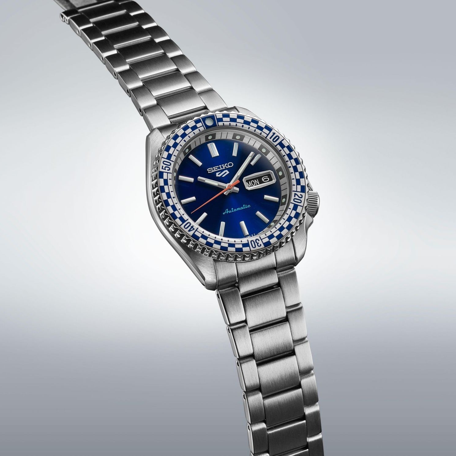 Seiko 5 Sports Petrol Blue Checker Flag Special Edition Blue Dial Silver Steel Strap Watch For Men - SRPK65K1 wholesalehk.shop
