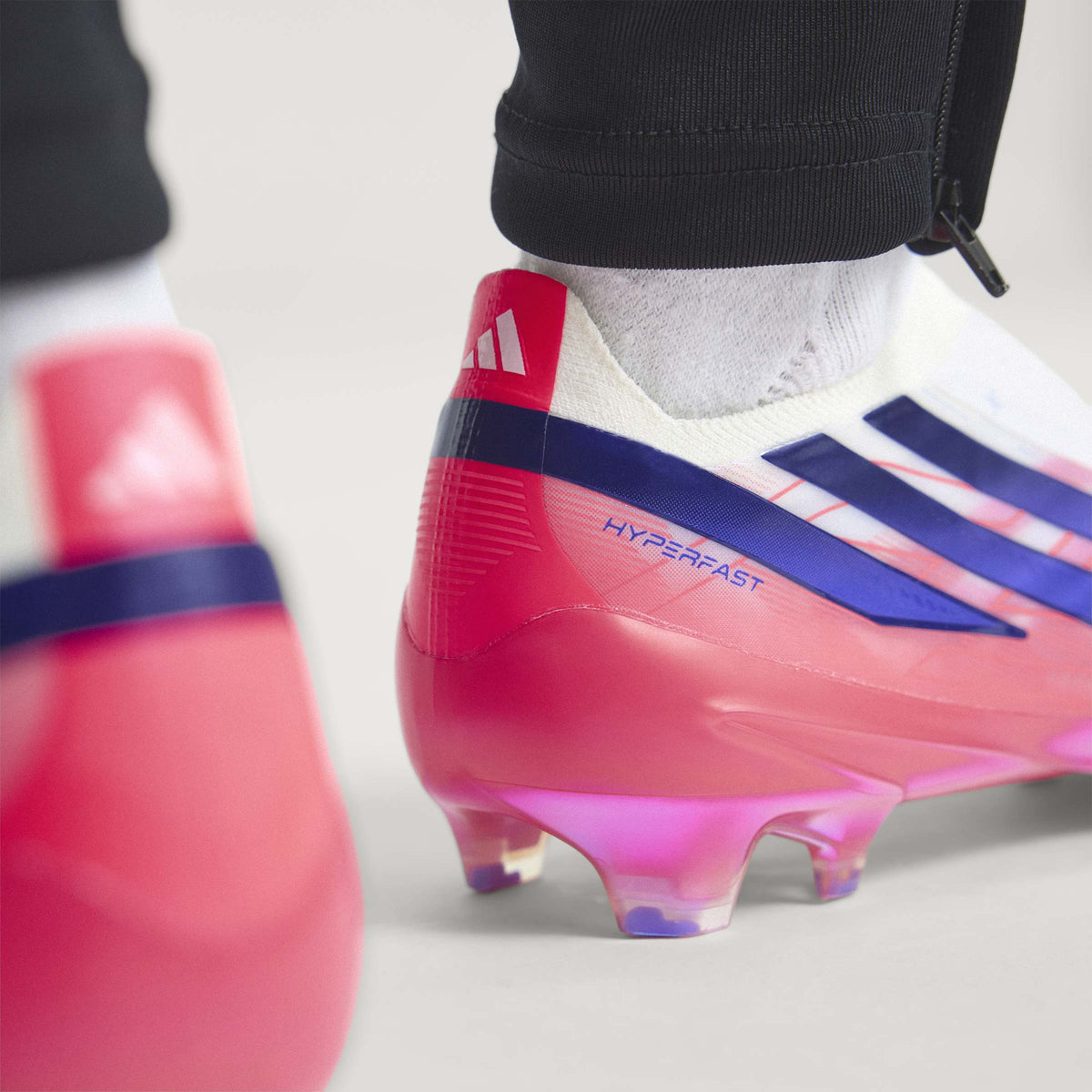 2026 New Arrival adidas F50 Hyperfast Elite Laceless Firm Ground Men's Soccer Cleats - White/Purple wholesalehk.shop