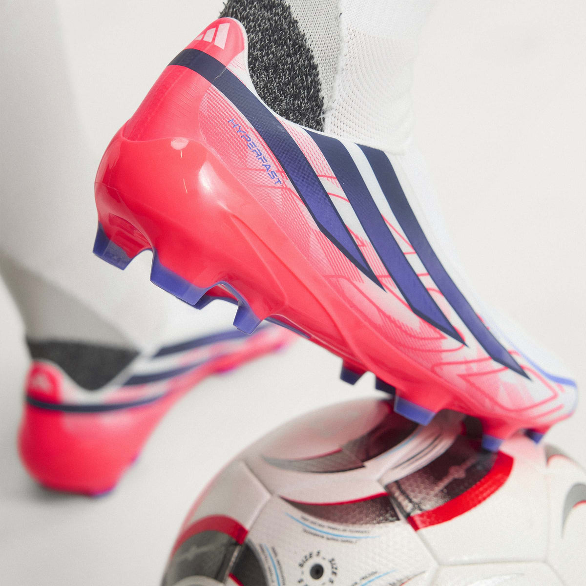 2026 New Arrival adidas F50 Hyperfast League Laceless FG Firm Ground Men's Soccer Cleats - White/Purple/Solar Turbo wholesalehk.shop