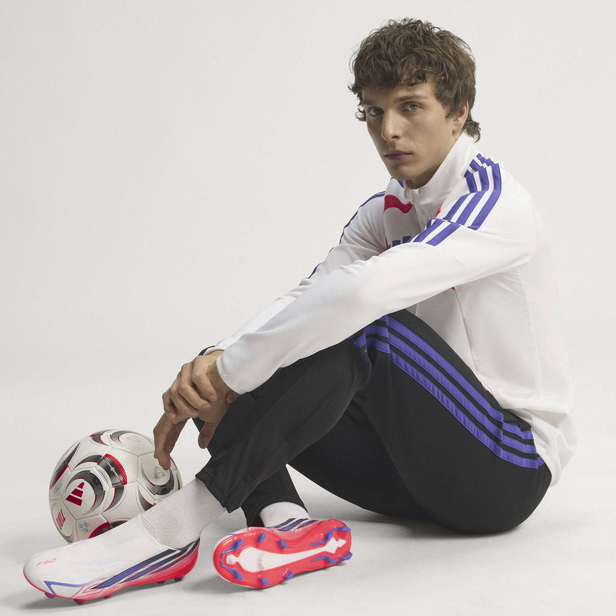 2026 New Arrival adidas F50 Hyperfast League Laceless FG Firm Ground Men's Soccer Cleats - White/Purple/Solar Turbo wholesalehk.shop