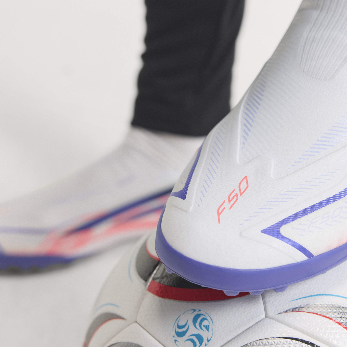 2026 New Arrival adidas F50 Hyperfast League Laceless Turf Men's Soccer Cleats - White/Purple/Solar Turbo wholesalehk.shop