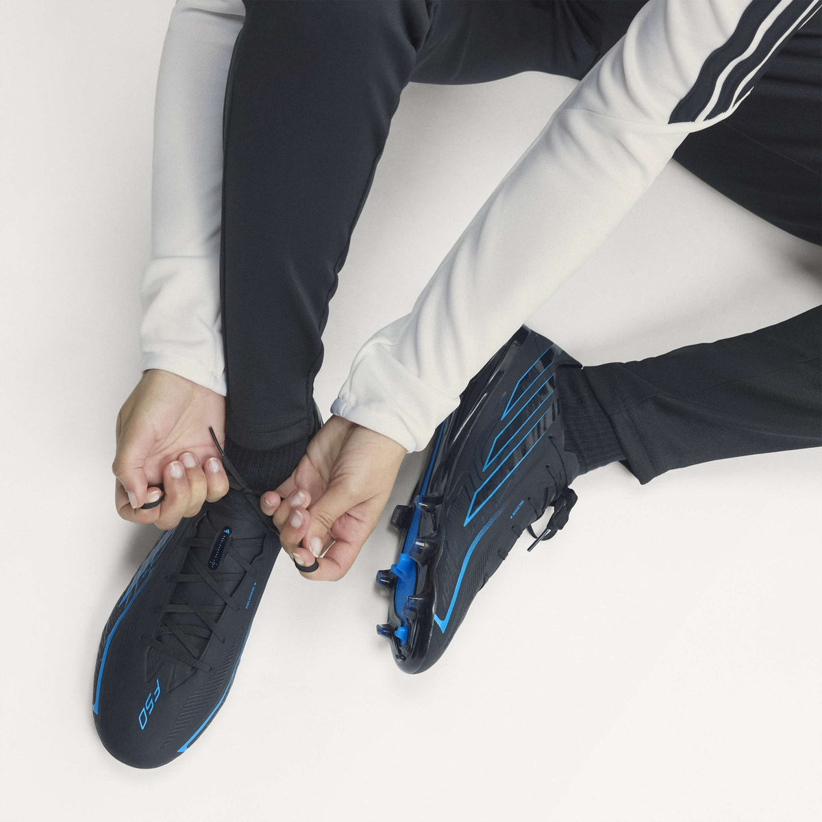 2026 New Arrival adidas F50 Hyperfast Pro Firm Ground Men's Soccer Cleats - Black/Black/Blue wholesalehk.shop