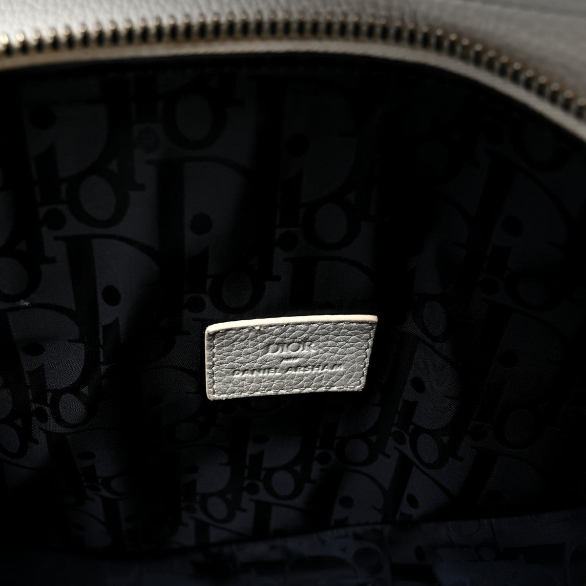 X Daniel Arsham Grained Calfskin Newspaper Print Saddle Bag White wholesalehk.shop
